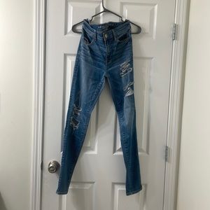 Dark wash ripped skinny jeans